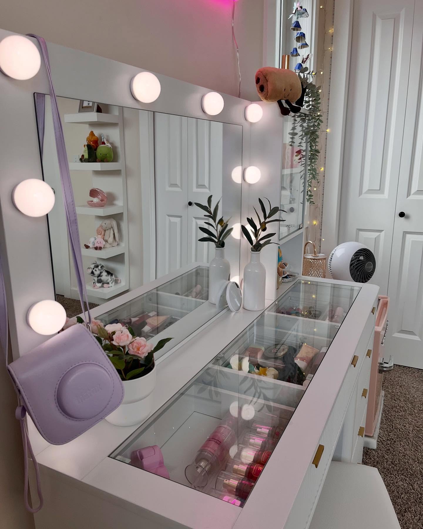 Lighted vanity mirror in a Winnipeg girls bedroom with styled surfaces