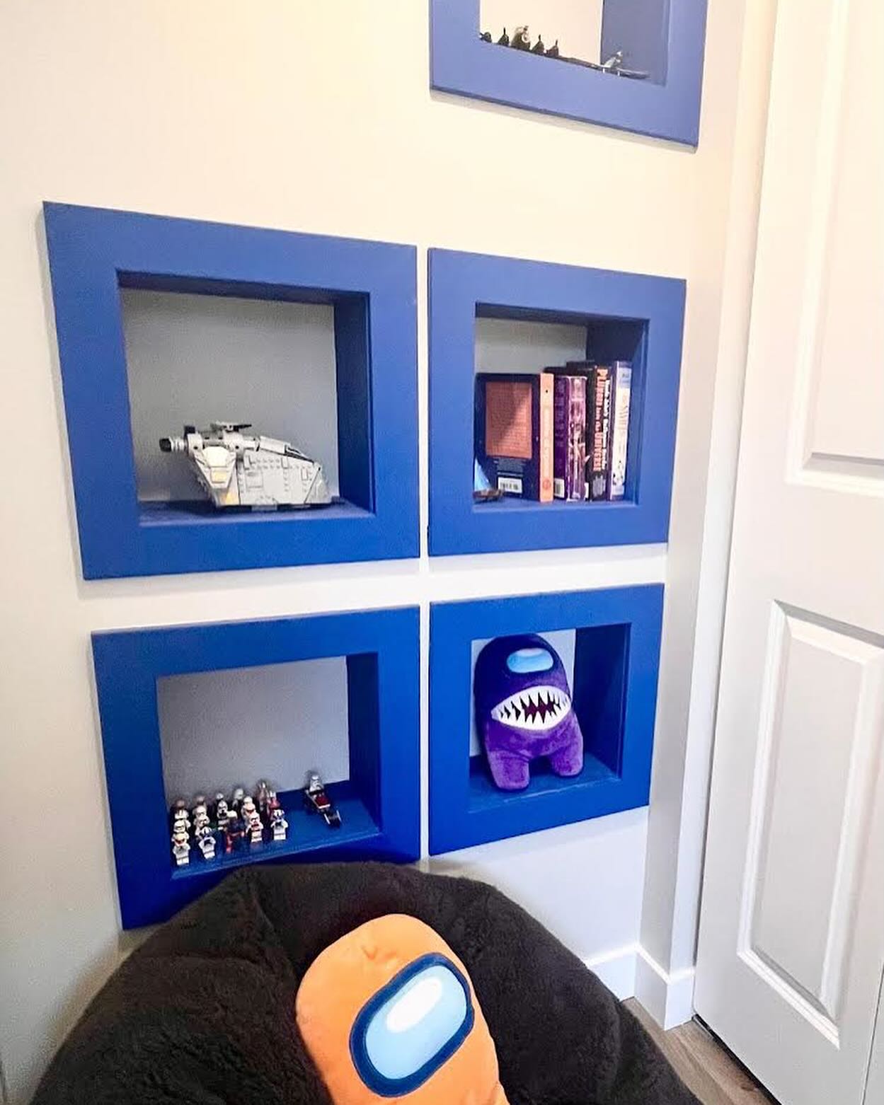 Under-stair closet storage in a Winnipeg basement kids bedroom