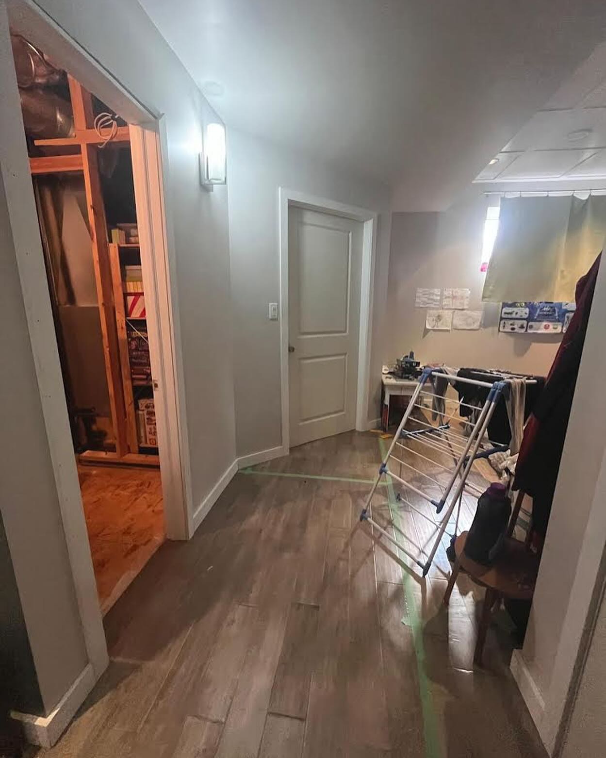 Kids basement bedroom bed and storage wall in Winnipeg